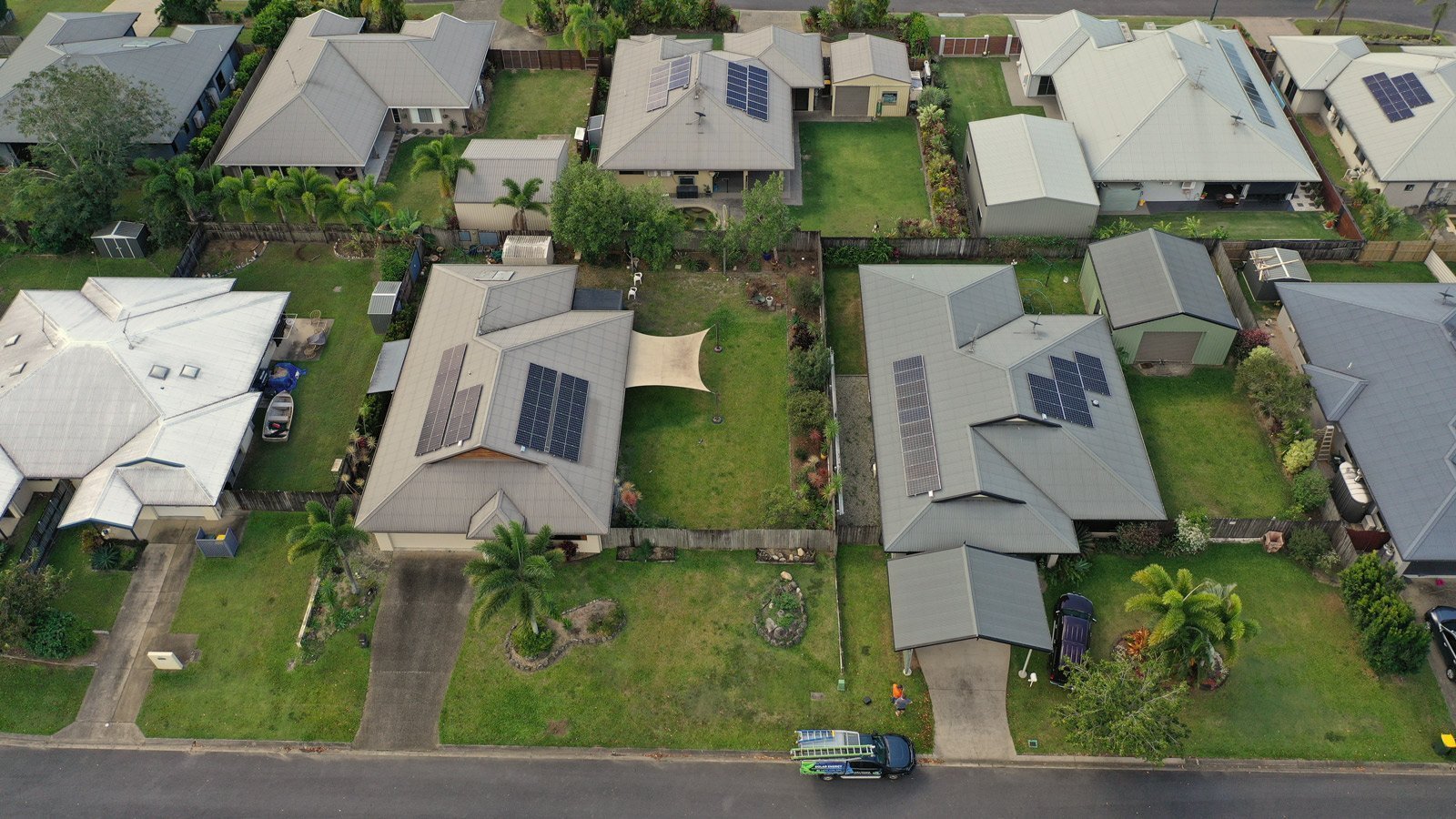 An aerial view of houses in Cairns with Solar Power.